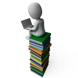 Student With Laptop On Books Shows Education